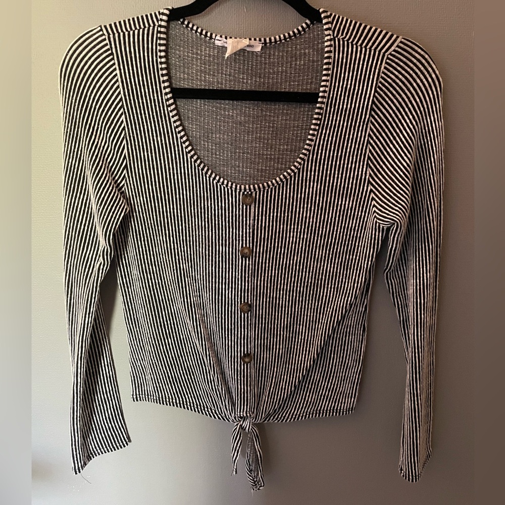Woman’s caution to the wind long sleeve top